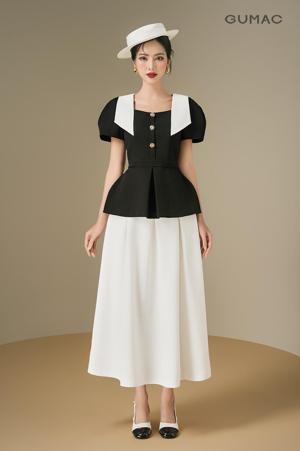 Phối váy dài với áo peplum cho người thấp