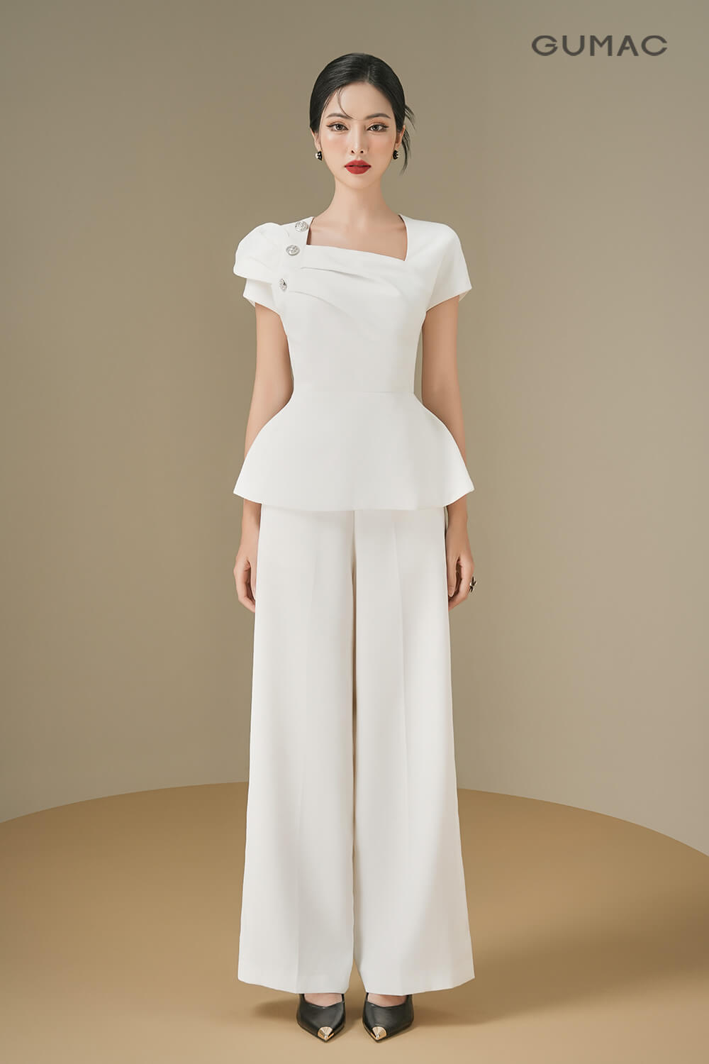 Áo sơmi peplum nữ đính nút Áo sơmi peplum nữ đính nút