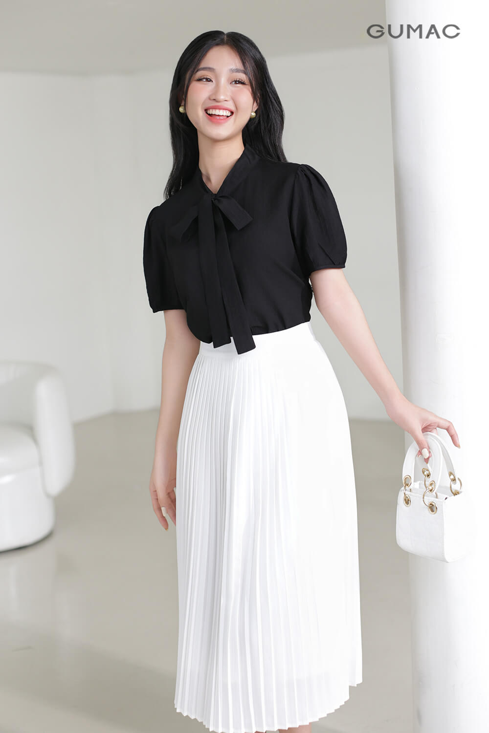 Chân váy dập ly B6
