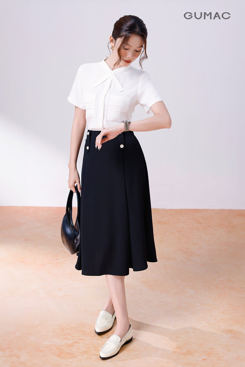 Chân váy dập ly mix giày bệt