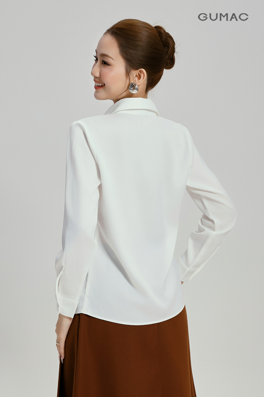 Áo sơmi giấu nút