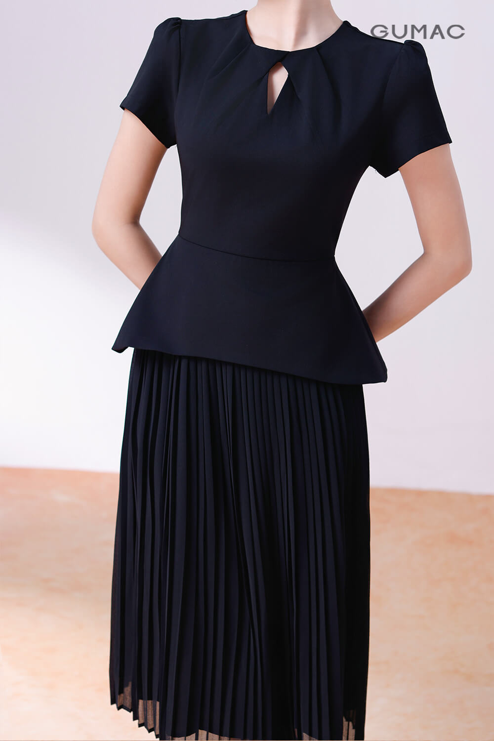 Đầm peplum dập ly