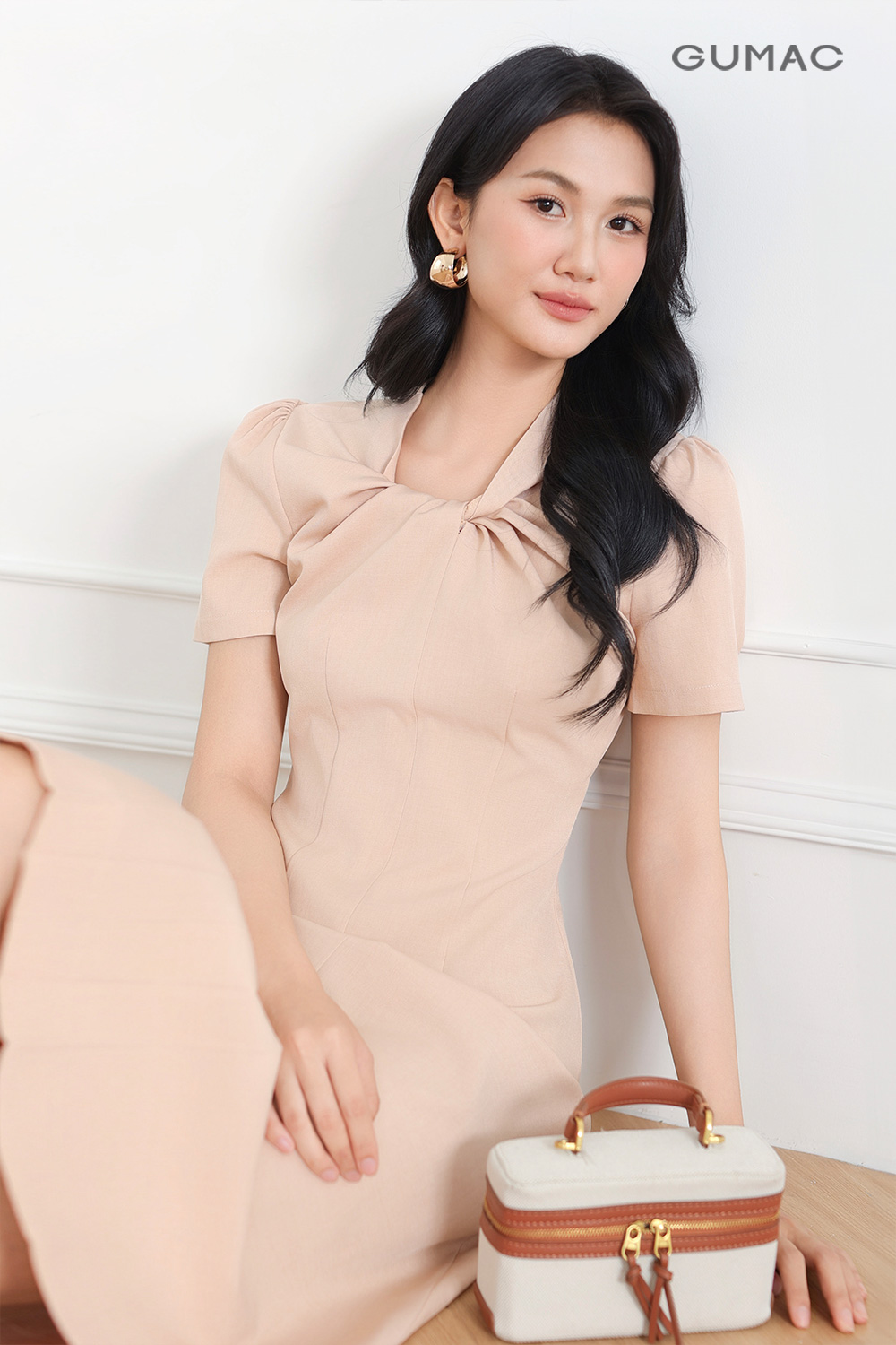 Đầm xoắn ngực tay phồng