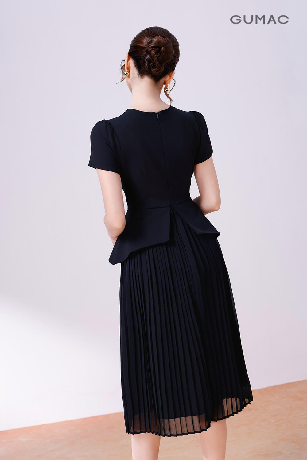 Đầm peplum dập ly