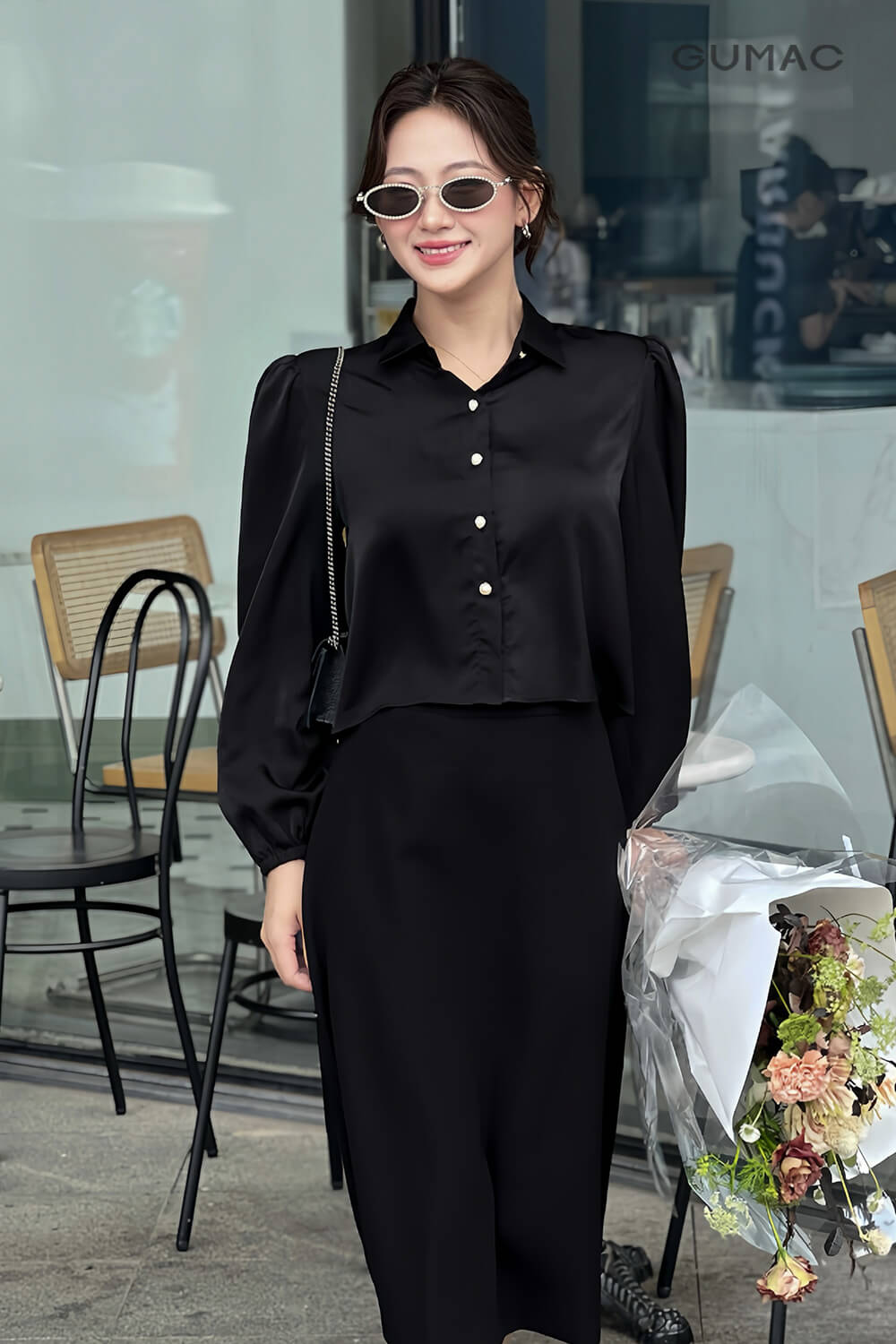 Mẫu áo peplum đen toát nên sự sang trọng