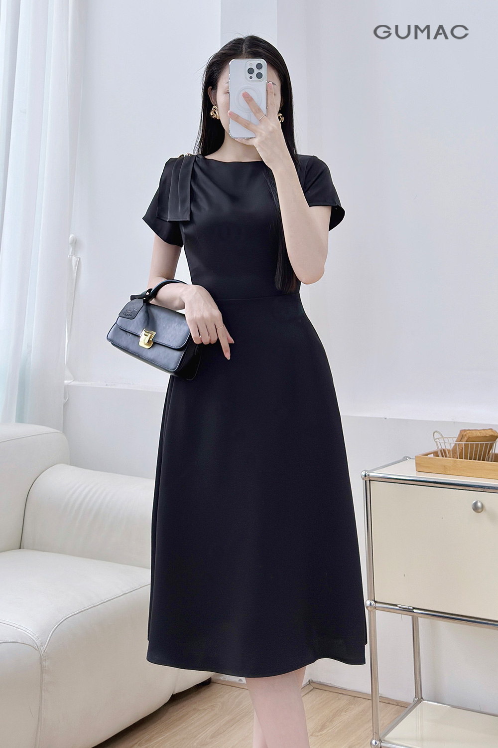 Đầm kiểu vai xếp ly