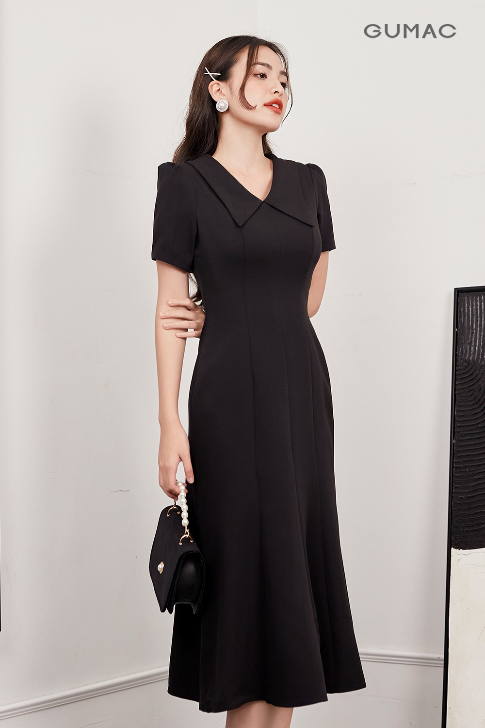 Đầm đuôi cá dáng midi