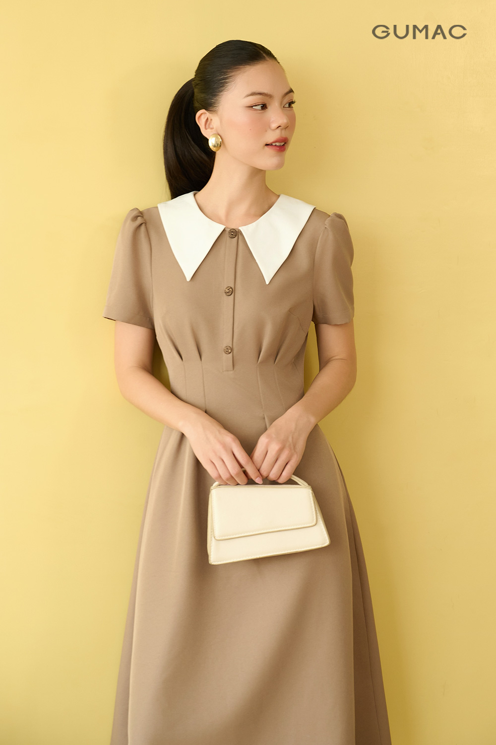 Đầm xòe xếp ly eo