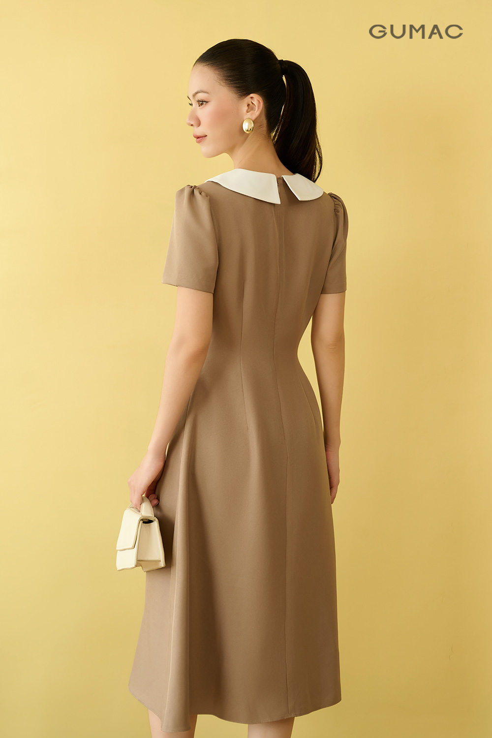 Đầm xòe xếp ly eo