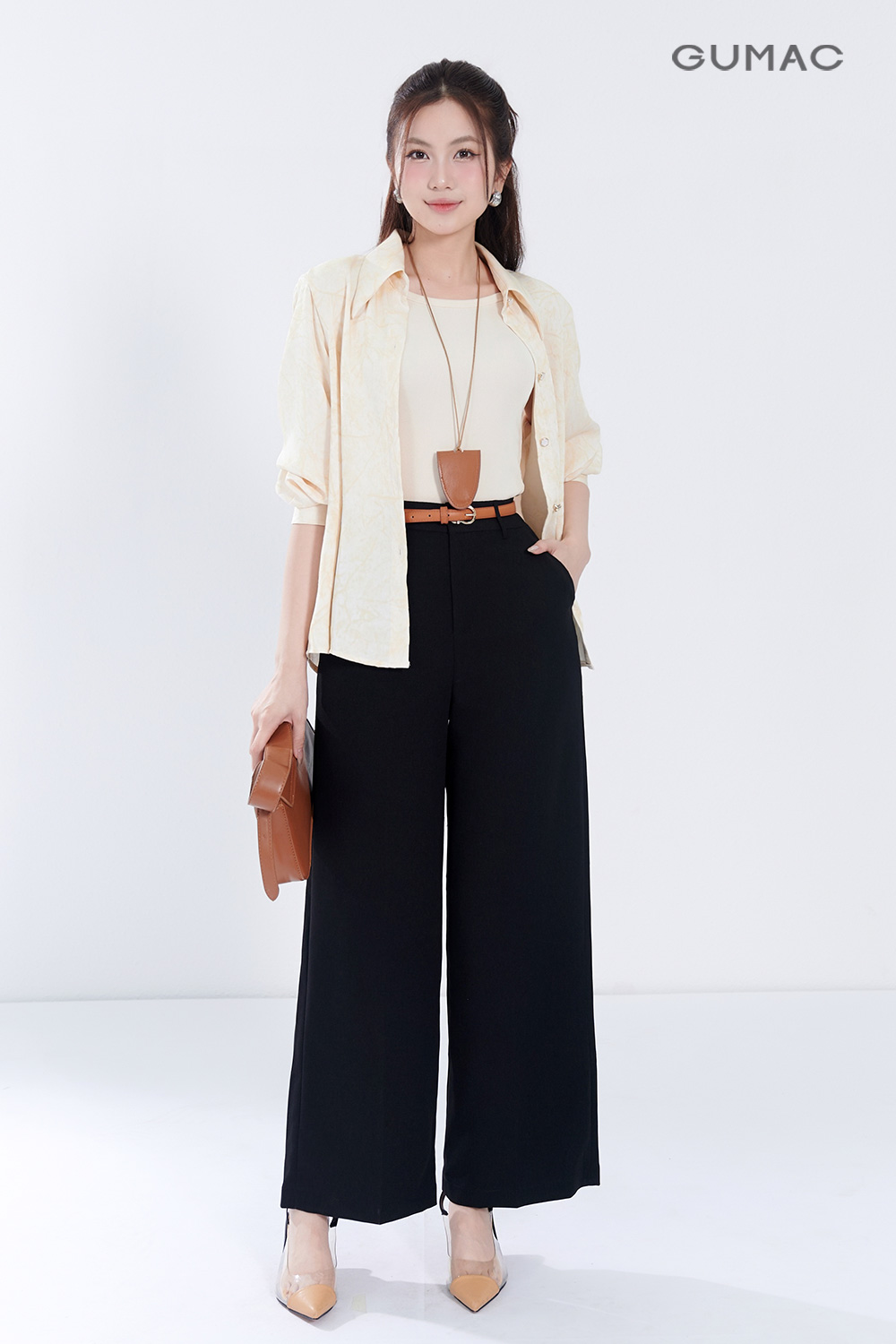 Quan cong so nu dep dang ong rong kieu tui mo GUMAC