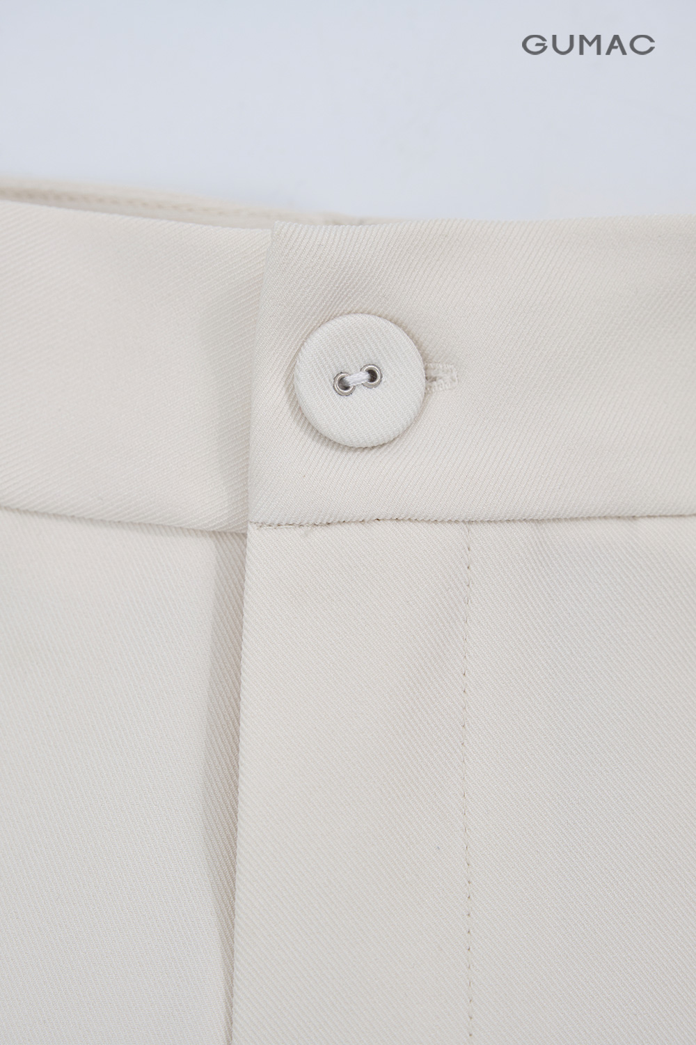 Quần suông nút bọc