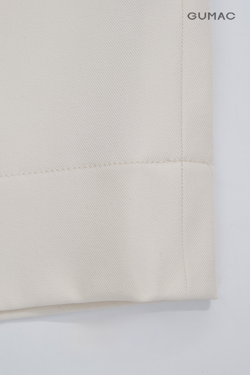 Quần suông nút bọc