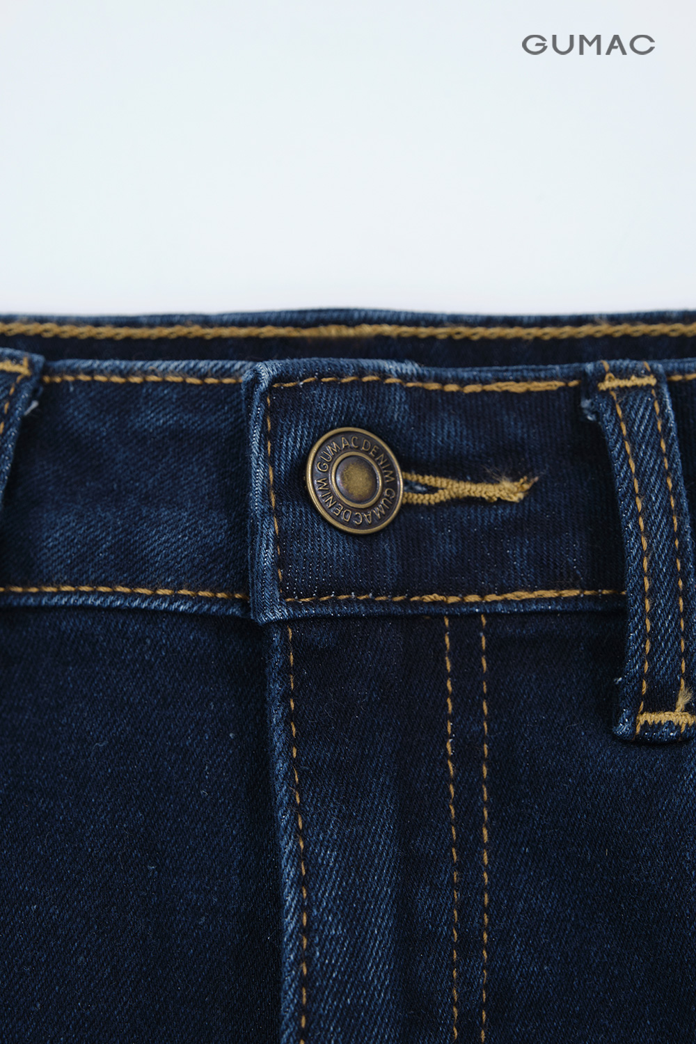 Quần jeans phối chỉ nổi
