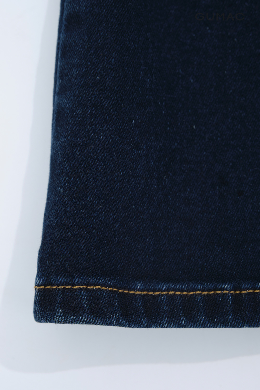 Quần jeans phối chỉ nổi