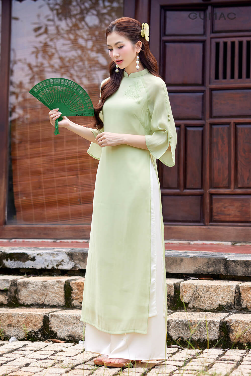 ao dai mau xanh thien thanh cho nang da ngam