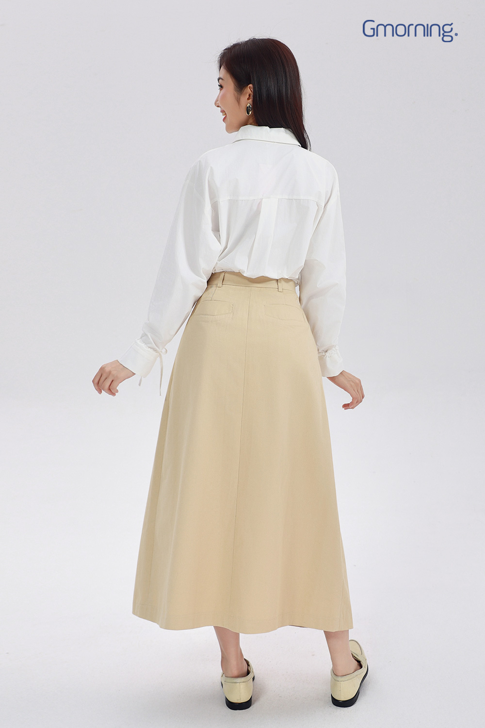 Chân váy midi xếp ly