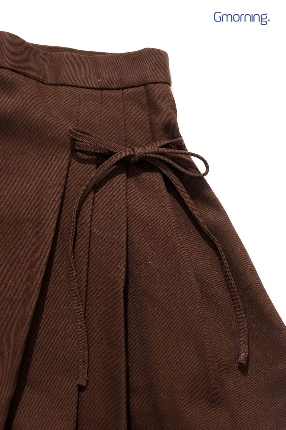 Chân váy nơ xếp ly