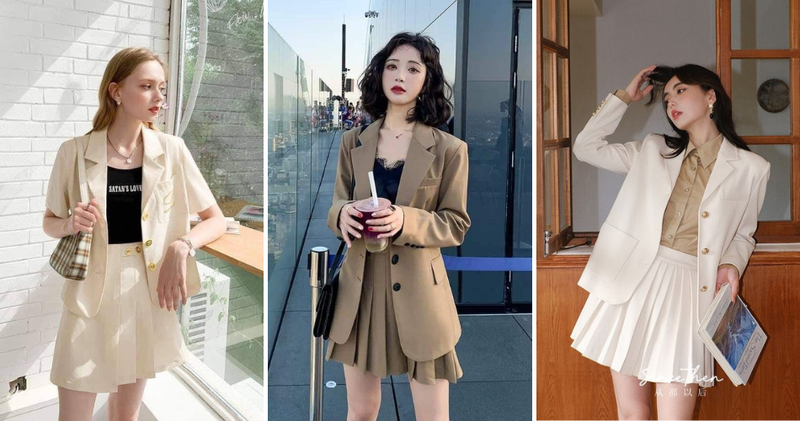 Khoác áo vest oversize màu be hoặc nâu, ghi xám bên ngoài chân váy xòe ngắn xếp ly bản to.