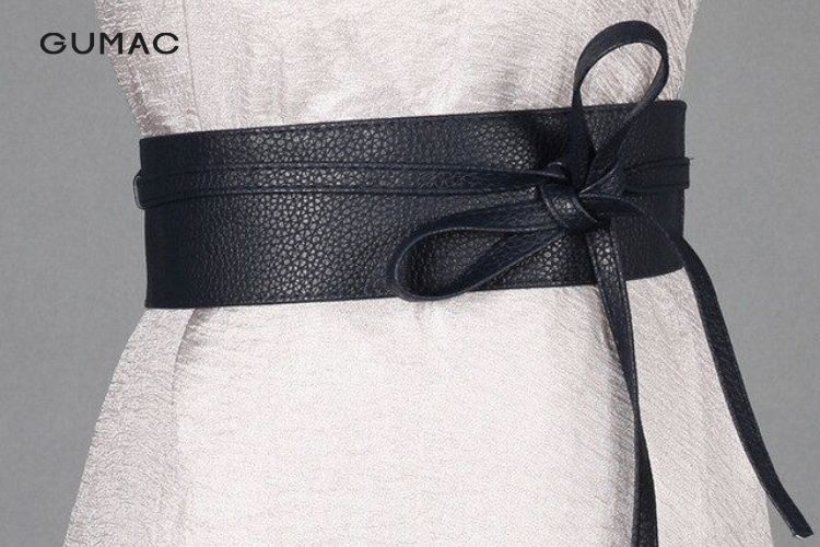 Đeo thắt lưng nữ theo cách buộc nút thắt nơ Đeo thắt lưng nữ theo cách buộc nút thắt nơ