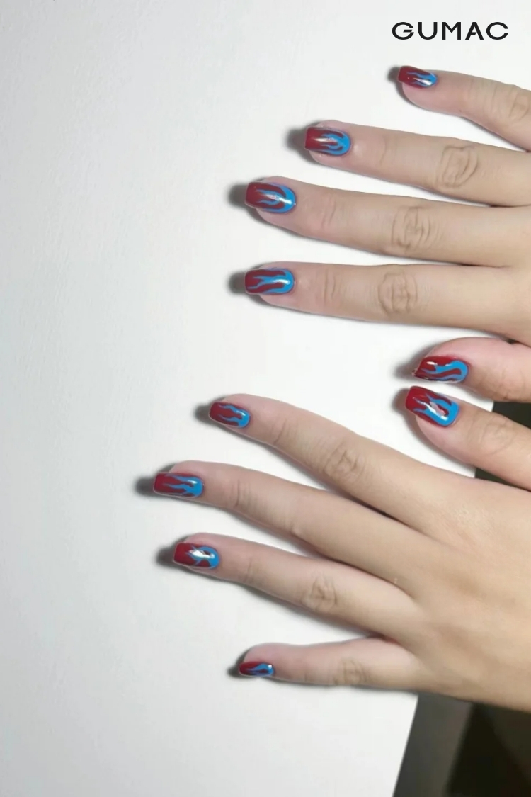 mau nail hoa tiet lua mau xanh do