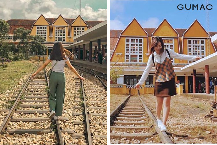 Tạo dáng chụp ảnh Đà Lạt ngồi ở đường ray xe lửa