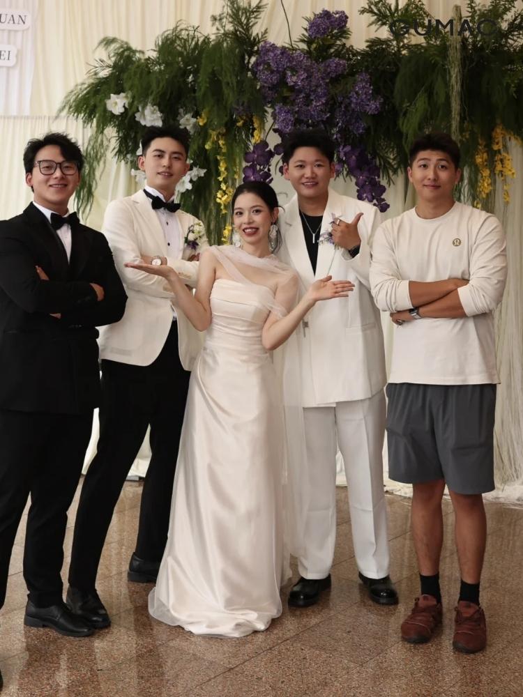 Elegant champagne silk dress with pearls.